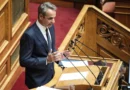 კირიაკოს მიცოტაკისი ნიკოს ანდრულაკისს მიმართავს 